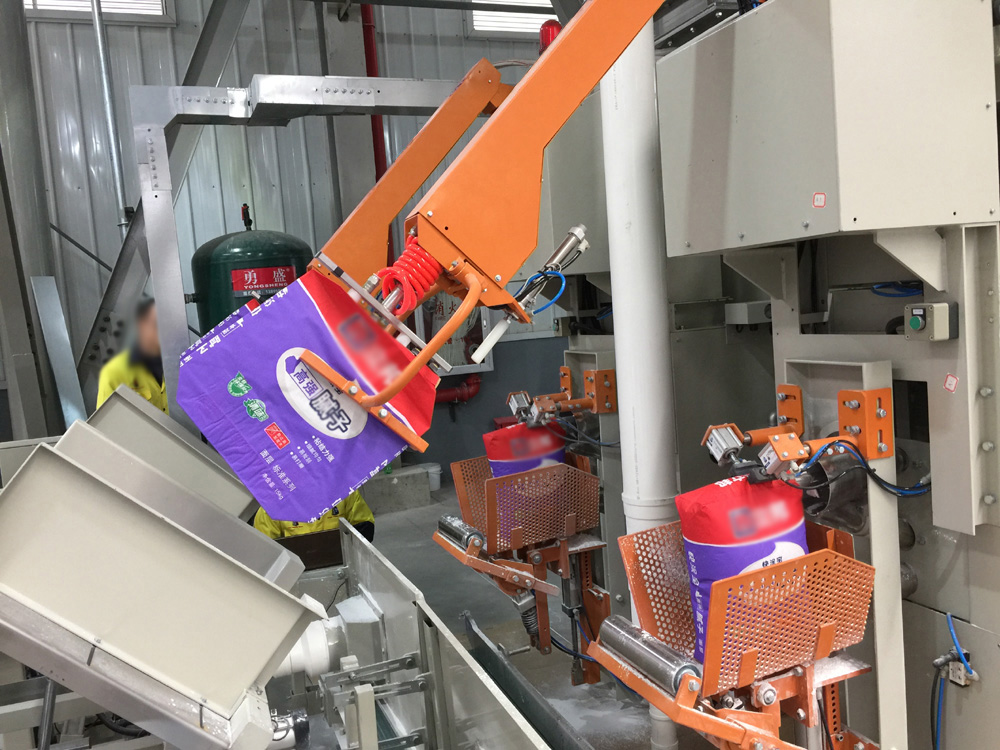 全自(zi)動閥口上(shàng)袋機 自動(dòng)上袋機 全(quán)自動包裝(zhuang)機 第1張